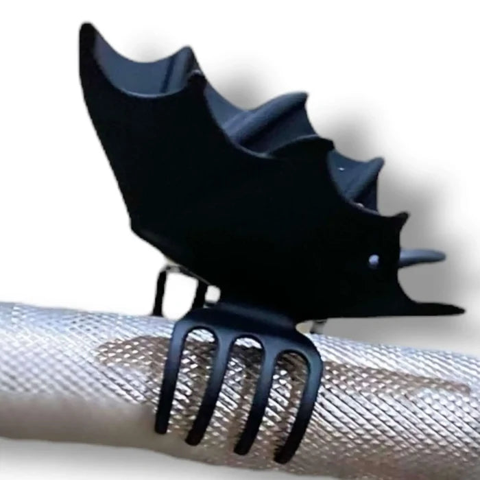 Gothic Bat Wing Hair Clip secured on hair, showcasing its elegant bat wing design and sturdy construction.