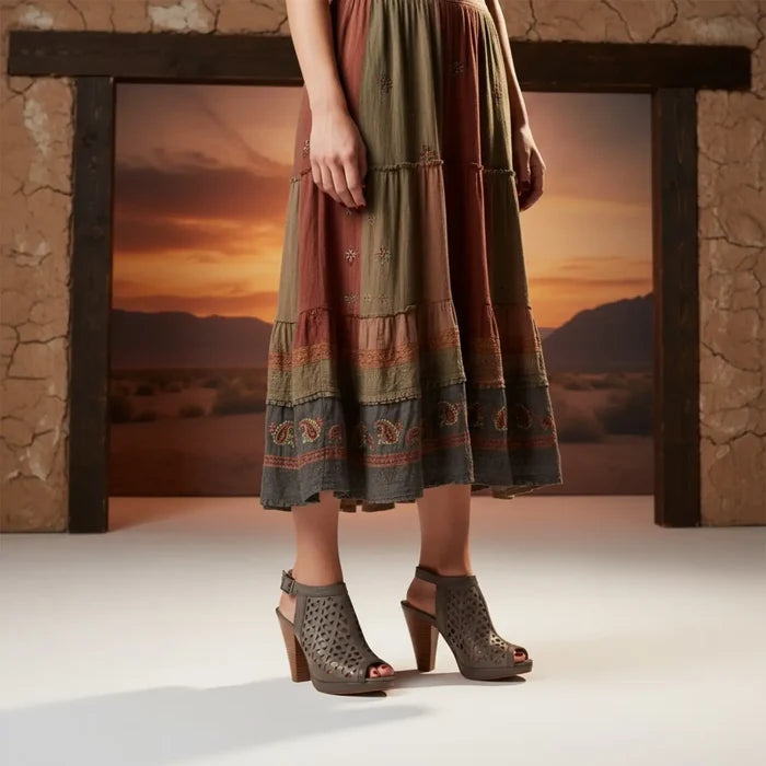 Gray laser cut ankle strap heels with peep toe, slingback fit and sculpted brown woodgrain cone heel