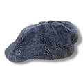 Gray tweed herringbone newsboy cap with short stiff brim and button top, styled as a vintage men’s flat cap.
