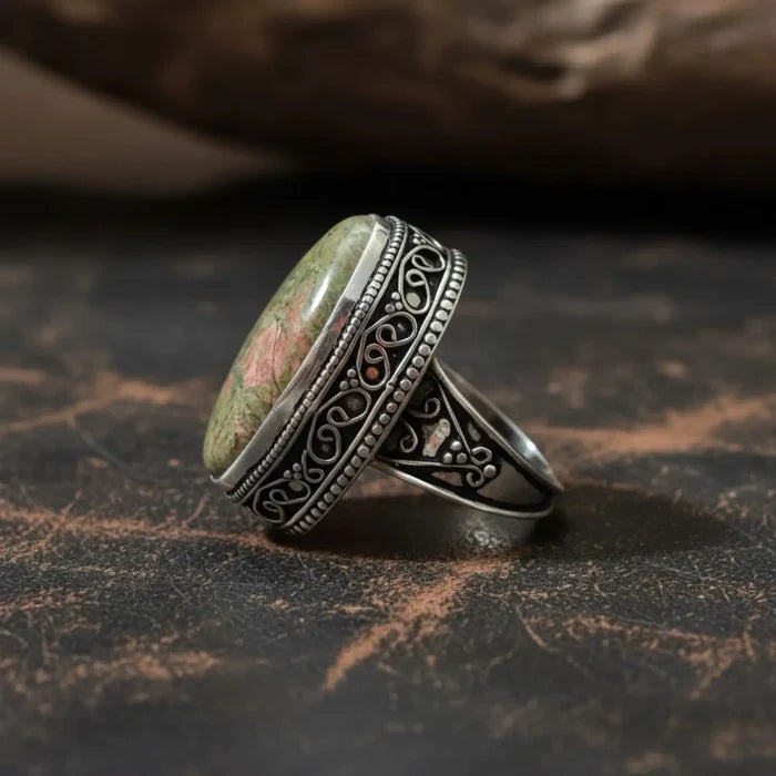Handmade Unakite sterling silver ring with green-pink cabochon, filigree setting and split-shank band 6.75