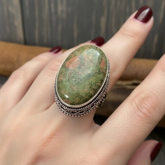 Handmade Unakite sterling silver ring with green-pink cabochon, filigree setting and split-shank band 6.75