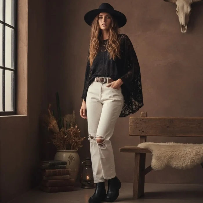 High Rise White Ripped Knee Straight Leg Jeans with ripped knees, brown stitching and cropped off-white denim fit