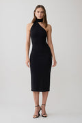 Woman wearing a black one shoulder tie midi dress.