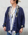 Dark teal and gold noragi jacket with indigo patchwork by Kiriko Made