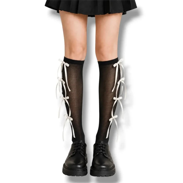 Knee High Socks with Long Bow Ribbons featuring ribbed knit texture and oversized satin bow details