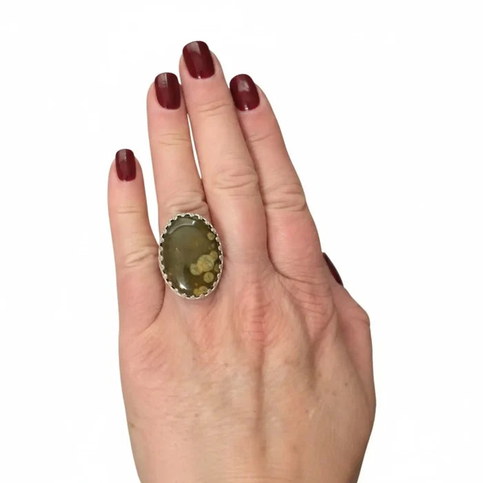 Large Fossil Jasper sterling silver ring with green-yellow cabochon, crown bezel and floral textured band 8.75