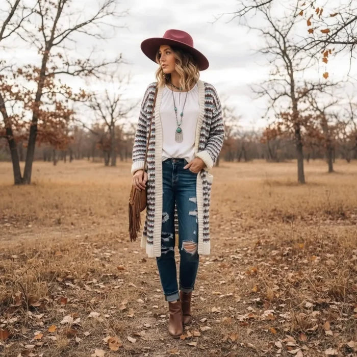 long striped knit cardigan jacket with pockets in ivory blue and brick red chunky crochet style