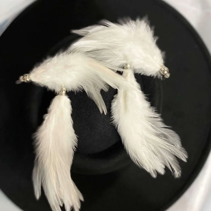 Long White Feather Tassel Earrings with pearl accents and boho festival style