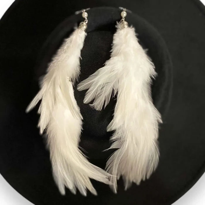 Long White Feather Tassel Earrings with pearl accents and boho festival style
