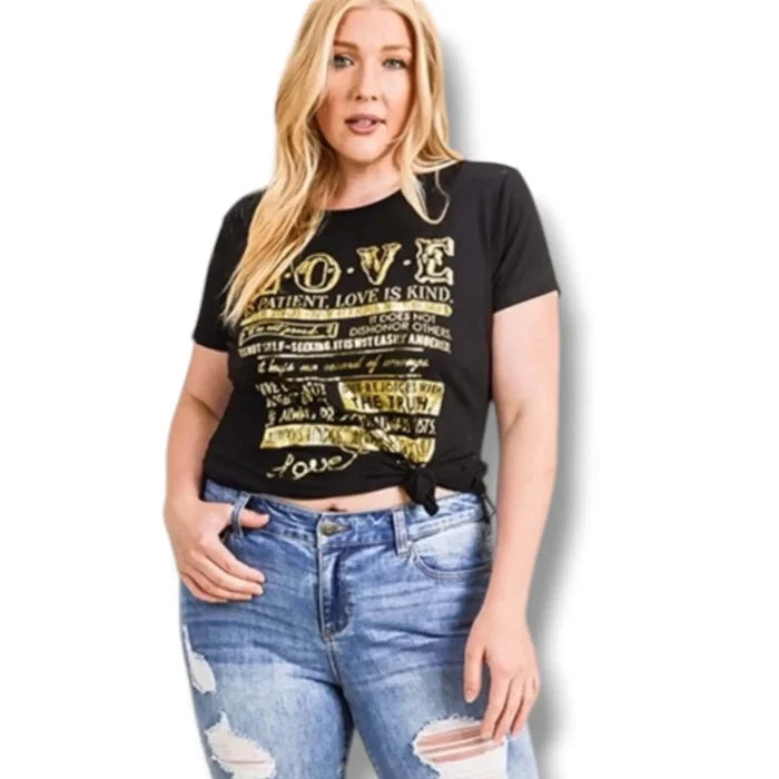 Women's black Love Never Fails Gold Foil Graphic Tee with black stretch fabric and plus-size fit / 2X