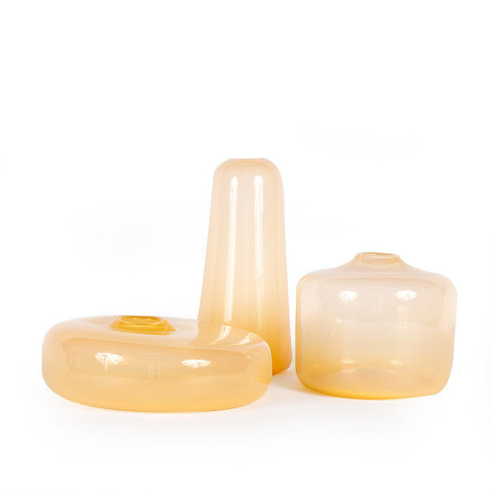 Melon Large Slim Vase alongside collection of melon vases in various sizes