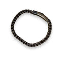 Men's Black Metal Rope Moto Bangle featuring a twisted design and secure quick-close pressure lock.