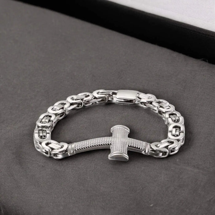 Men's Stainless Steel Cross Bracelet with textured silver cross and Byzantine chain links in polished 316L steel