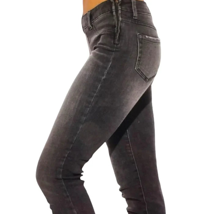 Mid rise black washed skinny jeans with side zipper, stretch denim and sleek no-front-pocket fit