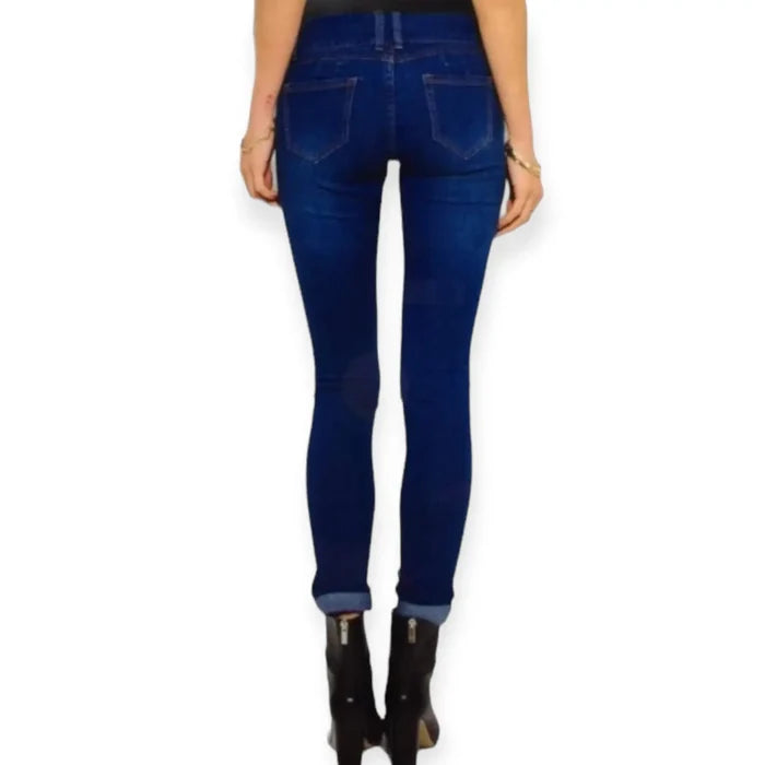 distressed mid rise skinny jeans dark wash stretch denim with knee distressing and double button waist
