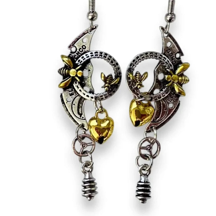 Mix metal steampunk earrings with silver and gold heart, bee, and gear charms – industrial dangle earrings for punk and whimsygoth style