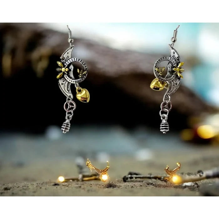 Mix metal steampunk earrings with silver and gold heart, bee, and gear charms – industrial dangle earrings for punk and whimsygoth style