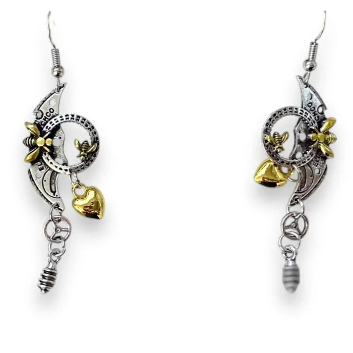 Mix metal steampunk earrings with silver and gold heart, bee, and gear charms – industrial dangle earrings for punk and whimsygoth style