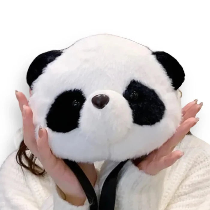 Cute Movin Panda Bear Crossbody Bag held in hands, featuring fluffy panda face design and soft black and white colors.