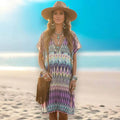 Multicolor Abstract Print Tunic Cover Up wearing on a beach with accessories