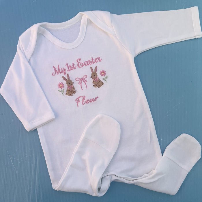 Baby romper with my first Easter embroidered in pink with a bunny, bow and some flowers