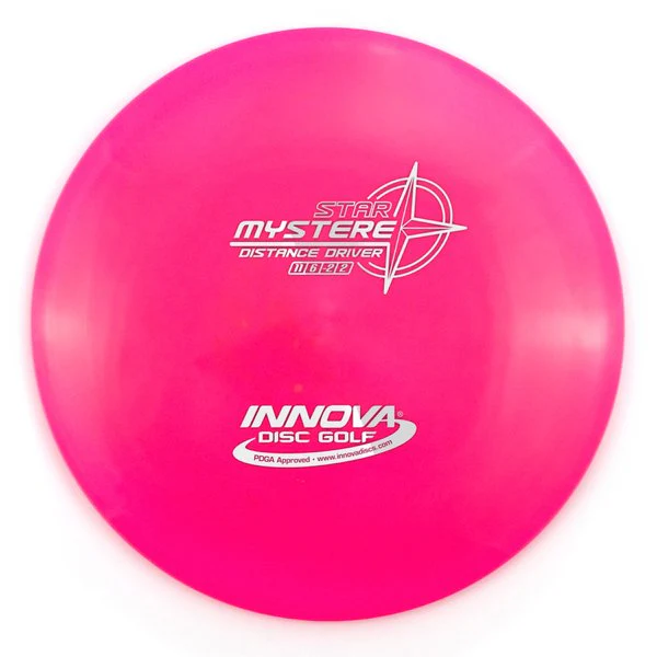 Pink disc golf disc with 'Innova Disc Golf' and 'Star Mystere' branding on a white background