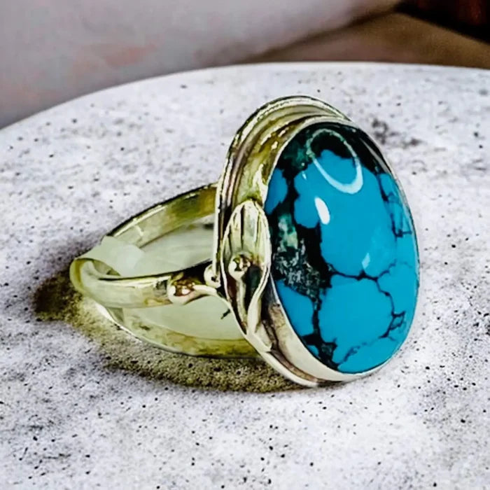 One of a Kind Natural Turquoise Ring with blue oval stone, dark matrix veining and handcrafted sterling silver setting