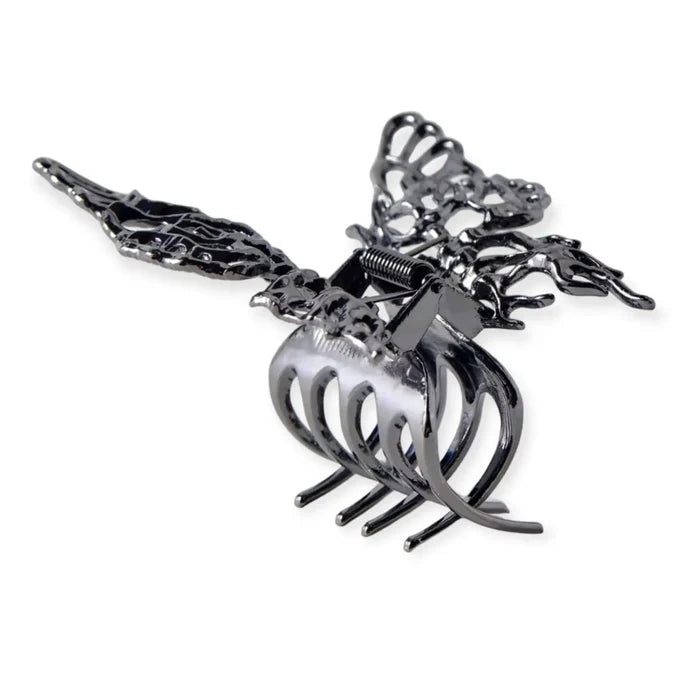 Oversized Black Butterfly Wings Hair Clips with hollow metal design and strong claw grip for goth and Y2K hairstyles