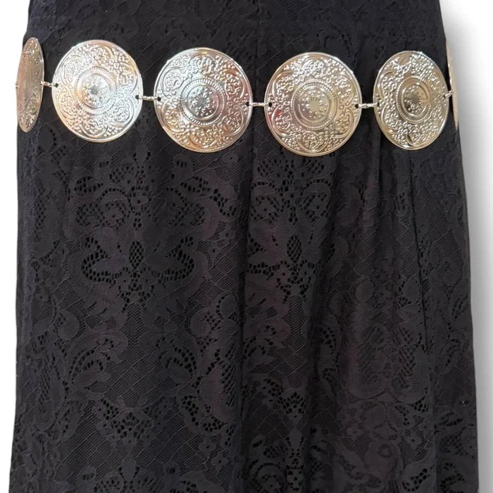 on black skirt Oversized Silver Floral Concho Chain Belt with nine engraved round links