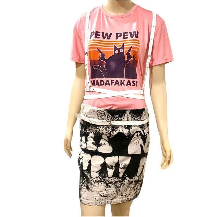 Model wearing a Pink PEW PEW Graphic Tee with a playful cartoon print, styled with a unique skirt and accessories.