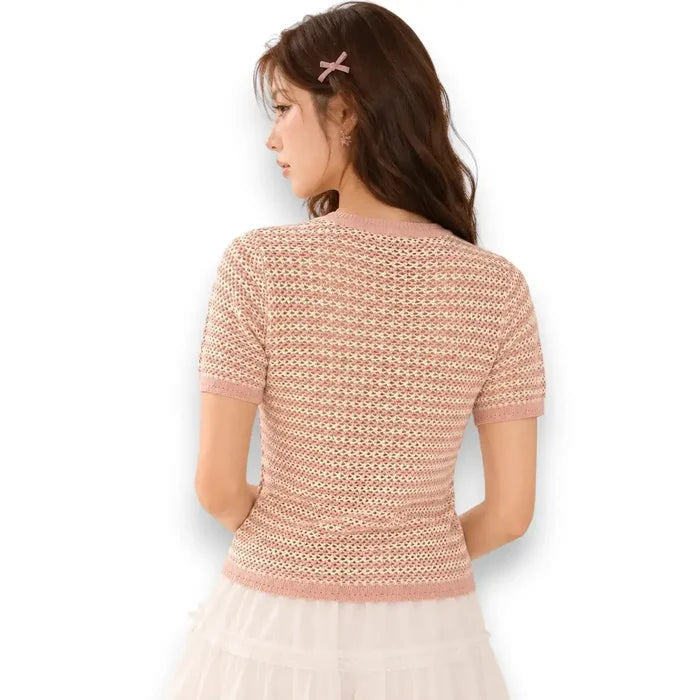 woman wearing Pink White Striped Crochet Short Sleeve Top with open-stitch cotton knit, crew neckline, ribbed trim, and hip-length fit