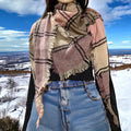 Plaid Triangle Neck Wrap Scarves woman wearing a multicolor with fringe, styled as a cozy layered shawl