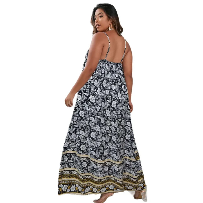 Plus floral summer cami maxi dress with V-neck, open back smocked panel, and adjustable thin straps in black and white, pink and white, or pink and orange prints, 1X to 3X