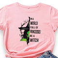 Plus pink witch graphic tee with “In A World Full Of Princesses BE A Witch” print.