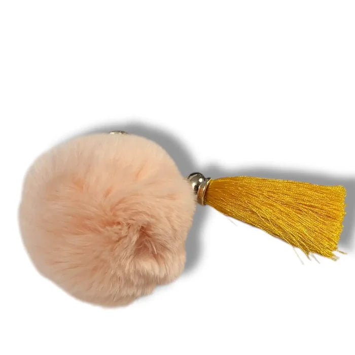 women's Plush Pink Fur Ball Tassel Handbag Charm with gold clasp and orange tassel one size