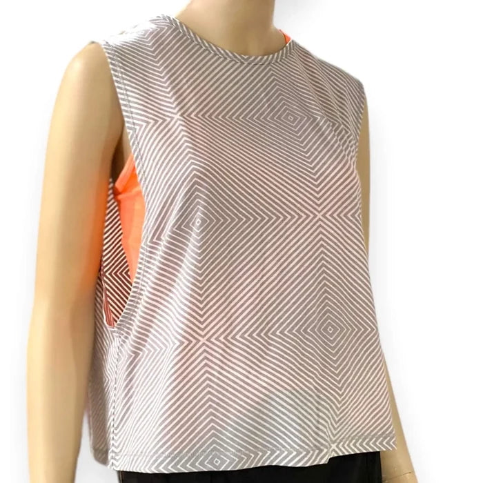 Puma gray white geo workout tank top with V-cutout back, side slits, and sleeveless loose fit
