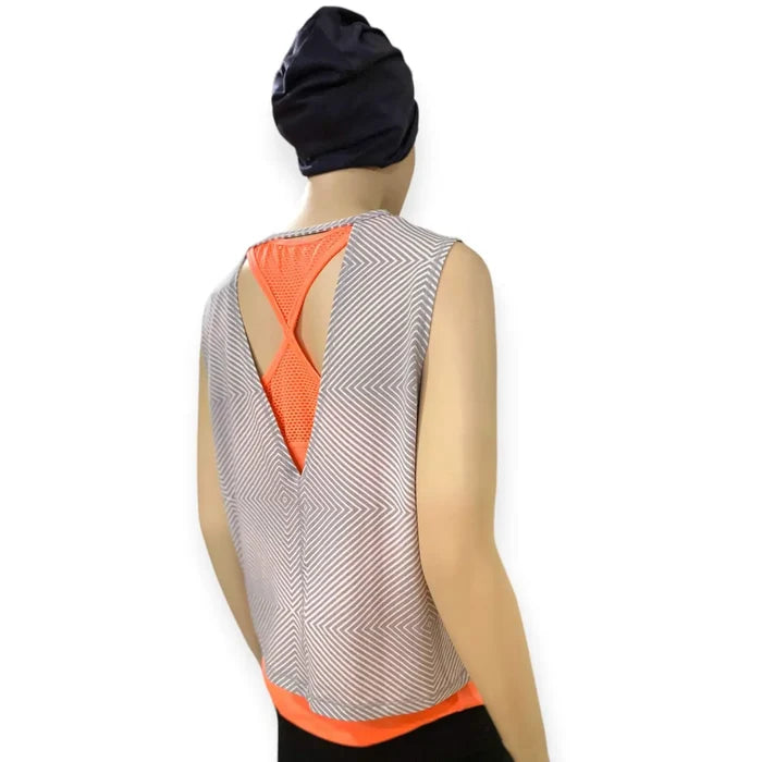 Puma gray white geo workout tank top with V-cutout back, side slits, and sleeveless loose fit