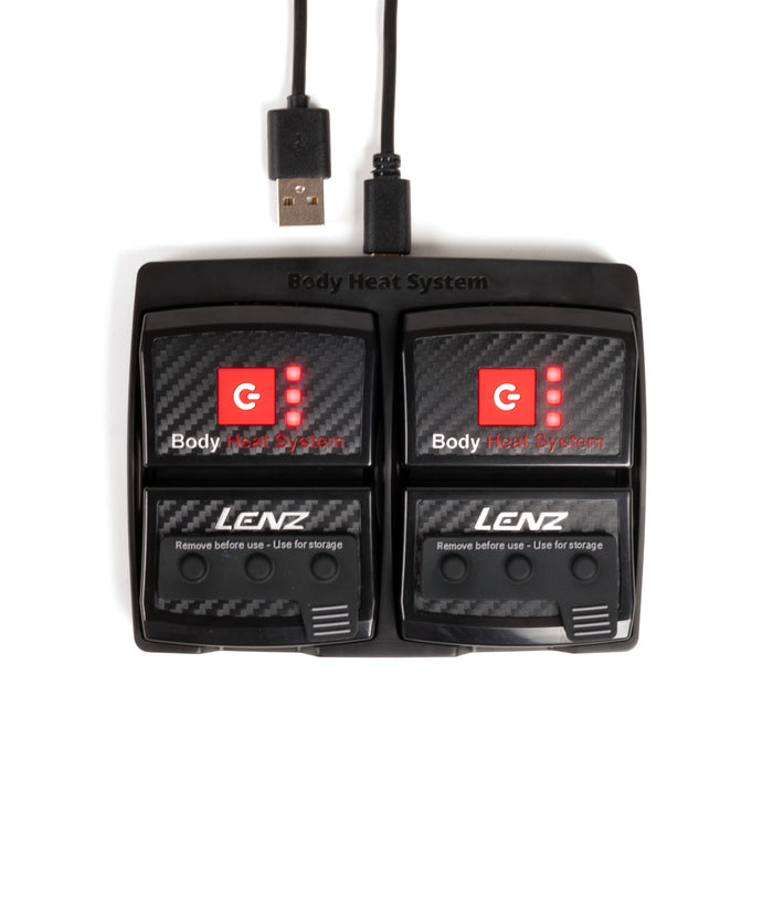 Lenz body heat system with two controllers and a USB cable on a white background