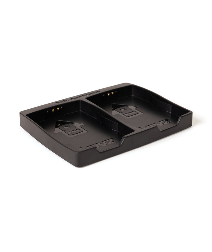 Black electronic device dock on a white background