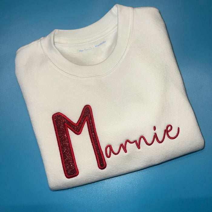 Red glitter initial sweatshirt with red embroidered name