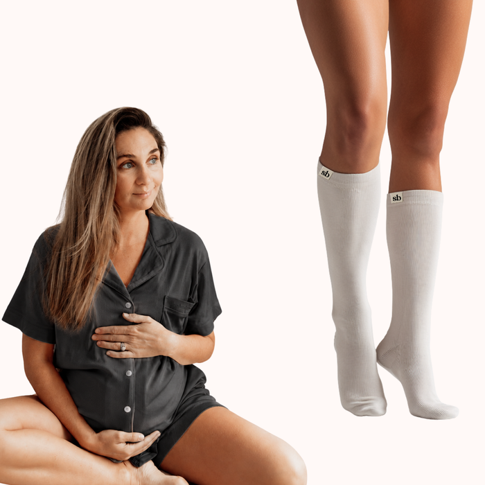 Rest & Recover Bundle: pregnant mum in charcoal maternity pyjamas alongside white maternity compression socks