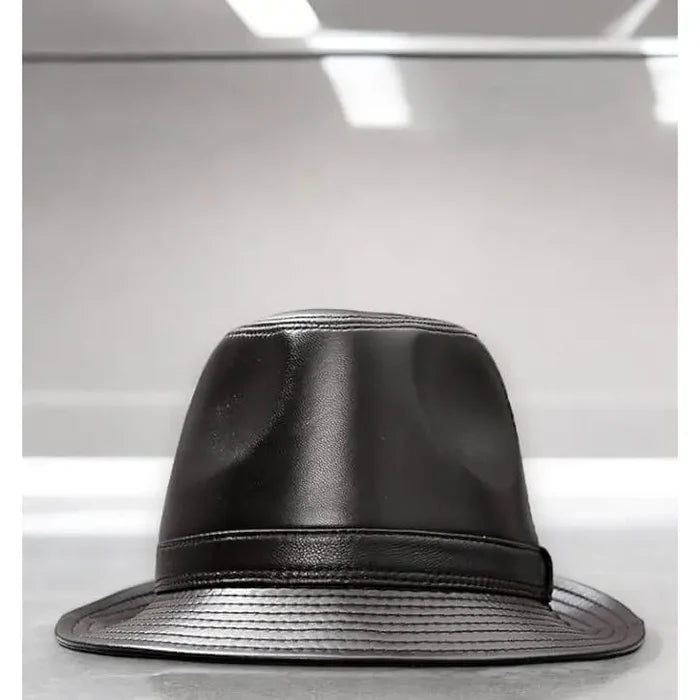 Retro Leather Trilby Fedora Hat dark brown close up on counter
