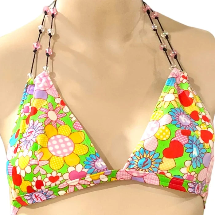 Yellow floral two-piece bikini set with hearts and elastane bead straps – playful slim fit swimwear for beach or pool party style