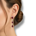 Ruby silver three-gemstone dangle post earrings – pear-shaped rubies in platinum-plated sterling silver