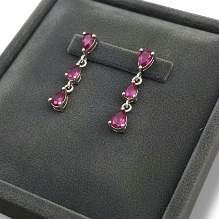 Ruby silver three-gemstone dangle post earrings – pear-shaped rubies in platinum-plated sterling silver