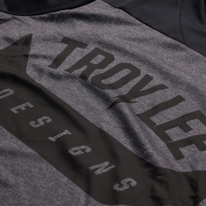 Gray t-shirt with 'Troy Lee Designs' branding on a plain background