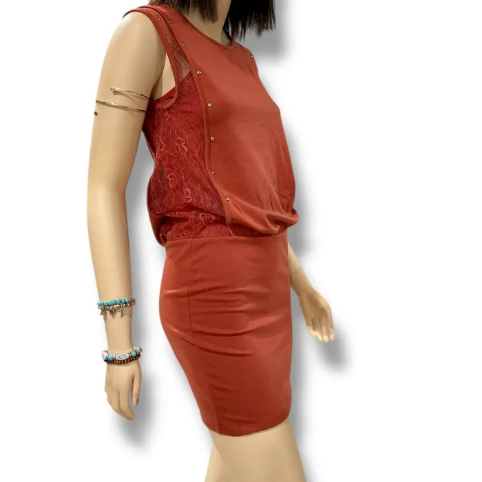 Rustic Brown Sleeveless Bodycon Mini Dress with brass studs, floral lace side panels, and fitted boho western silhouette model wearing small