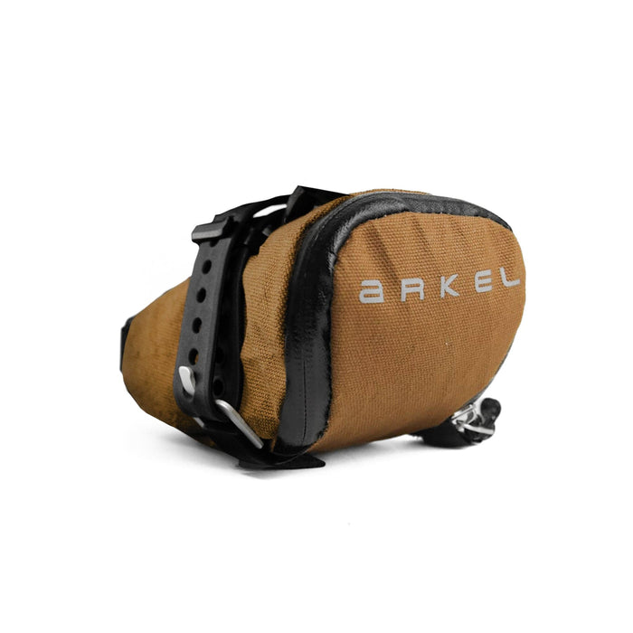 Brown bicycle seat bag with black straps on a white background
