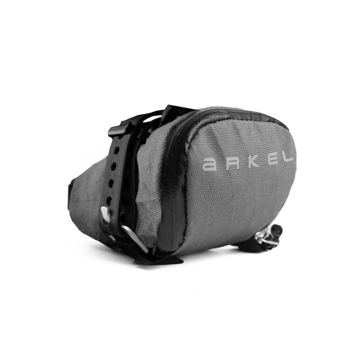 Gray saddle bag with 'ARKEL' branding on a white background