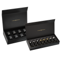 Scent Raider Sample Kit by The Beard Struggle, two open black gift boxes holding eight beard oil sample bottles and eight beard balm sample jars